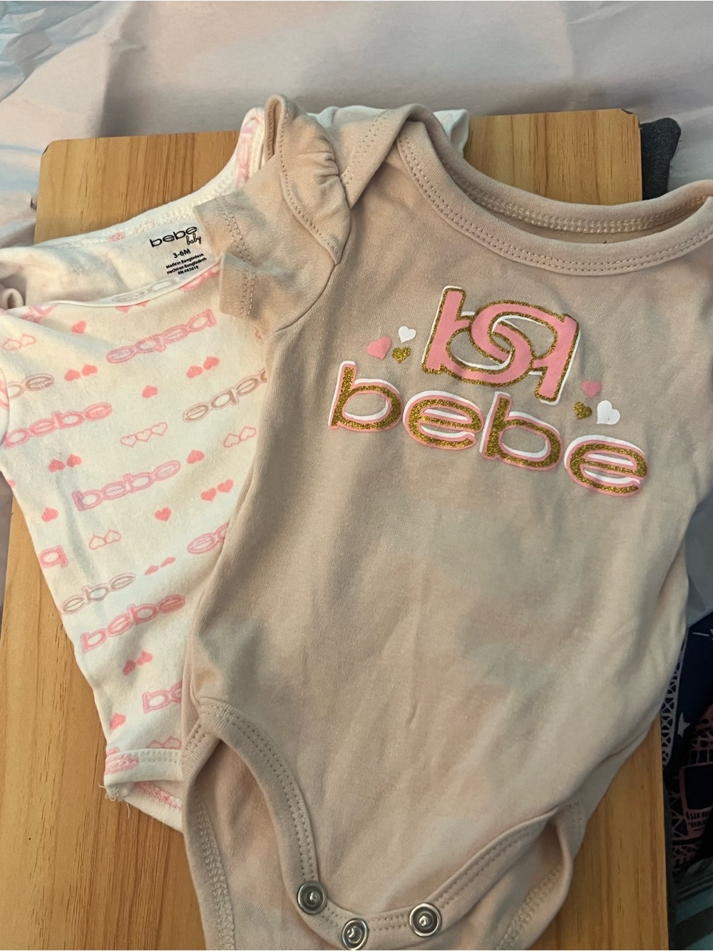 bebe Beige and Pink Logo One-Piece Bodysuit